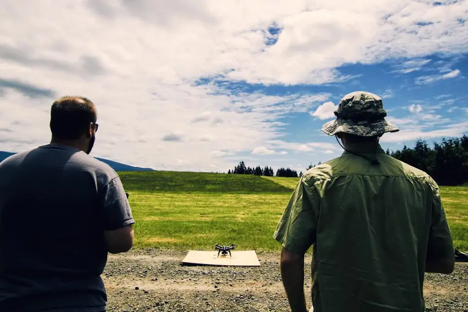 Drone pilots train with a small survey drone (file photo)