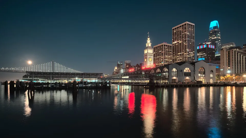 The San Francisco Ferry Building lit up at night from Pier 1
