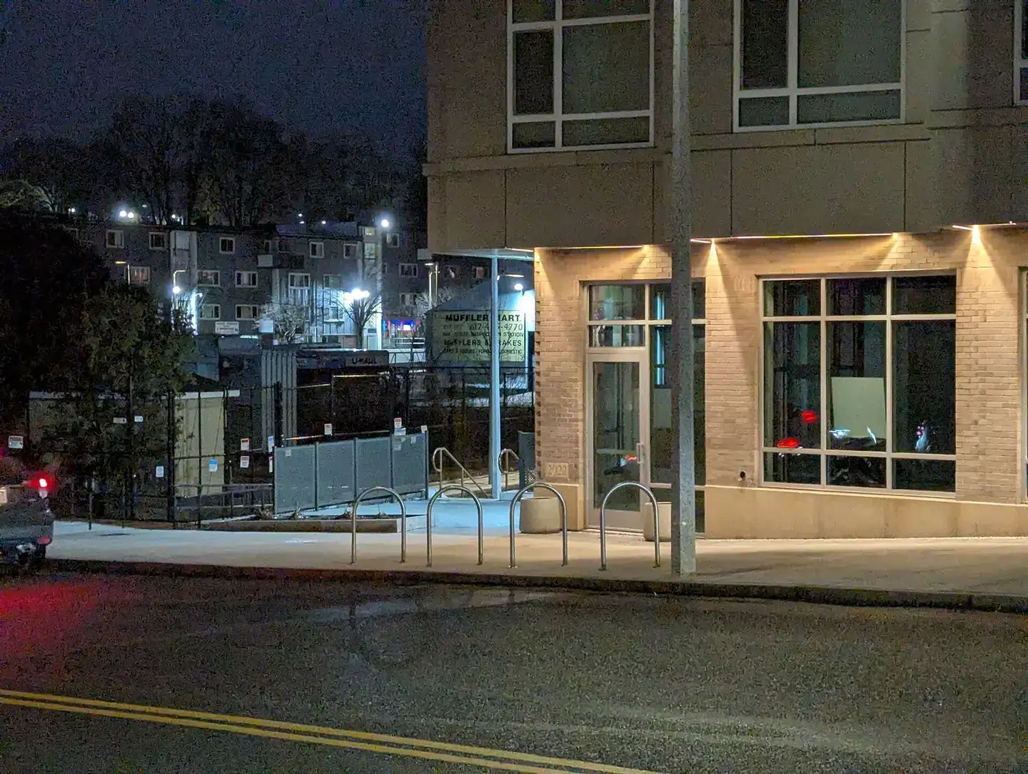 4 staple style bike racks on Centre St Jackson Square