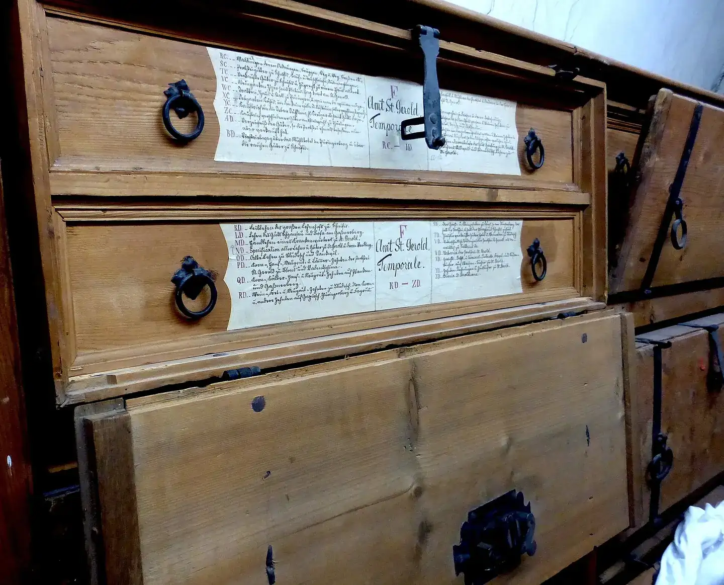 Old wooden boxes that once contained the archives of Einsiedeln Abbey